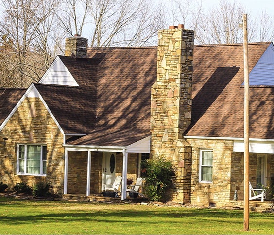 residential house showcasing roof installation from a Winston Salem NC roofing company