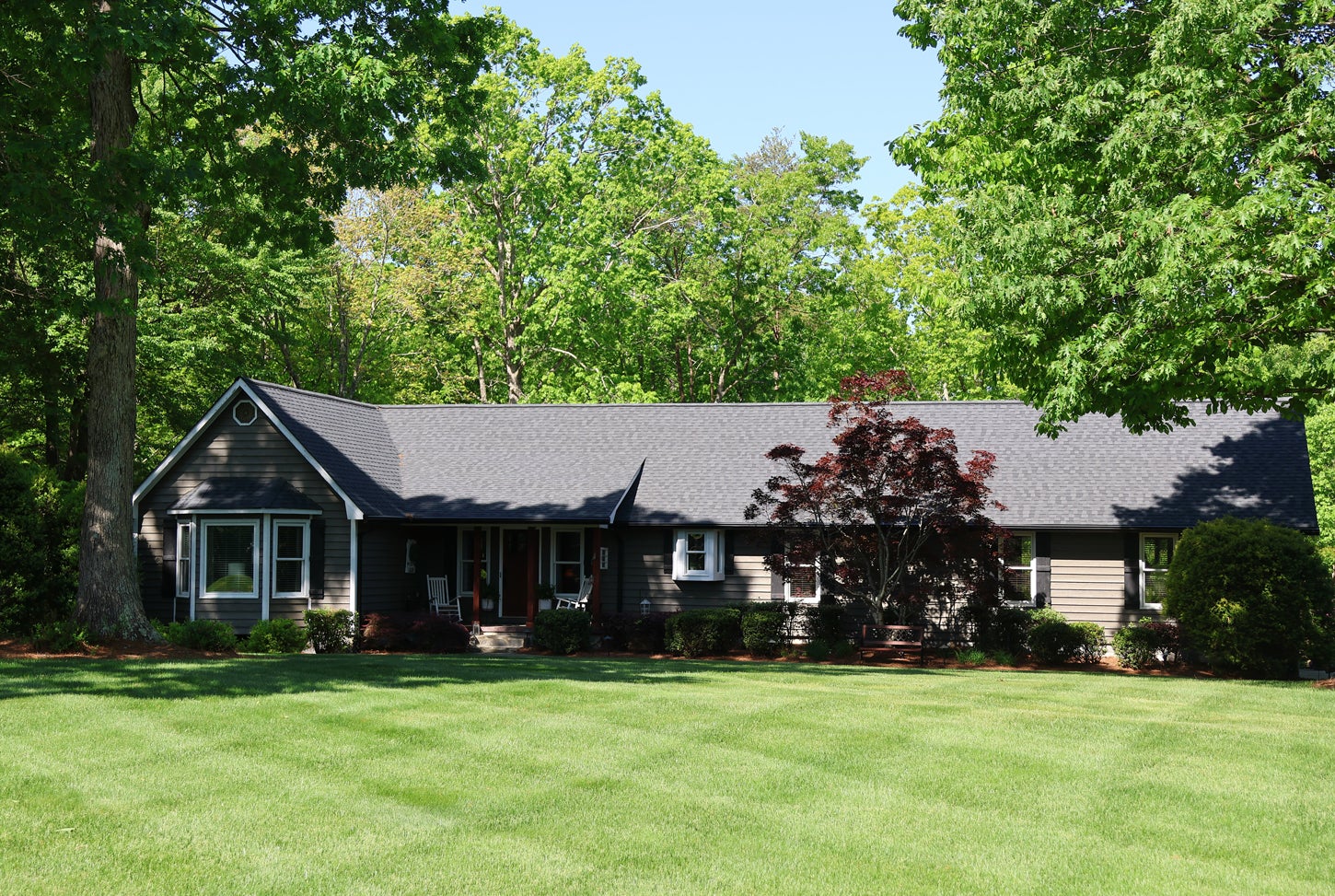residential house showcasing roof installation from a Winston Salem NC roofing company