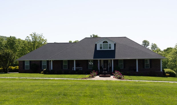 residential house showcasing the best shingles for roofs