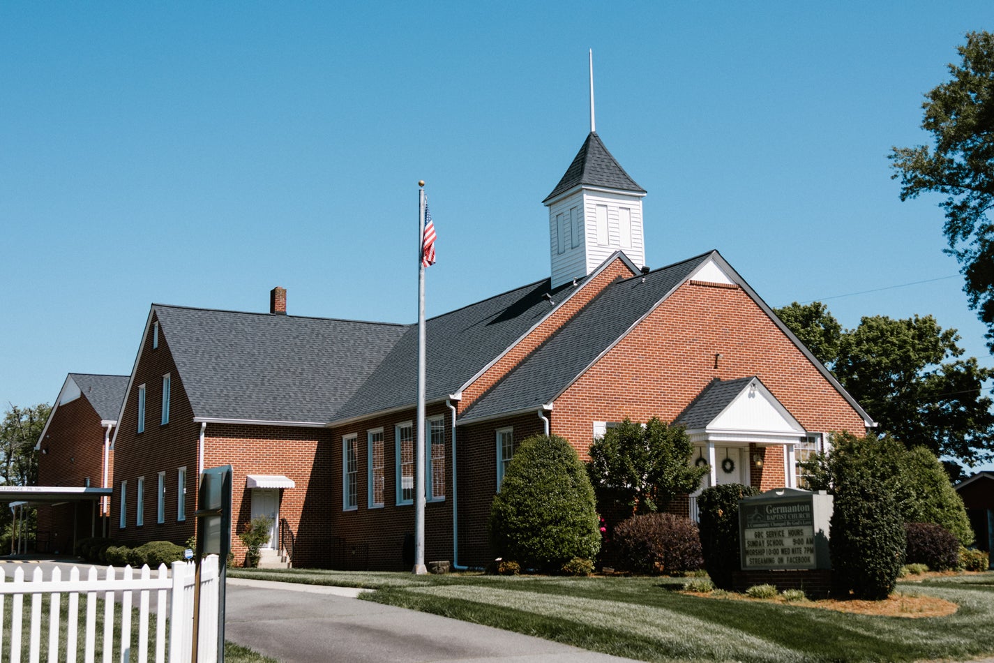 Church showcasing commercial roof installation from a Winston Salem NC roofing company